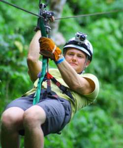 Canopy tour zip lines in trees of rain forest