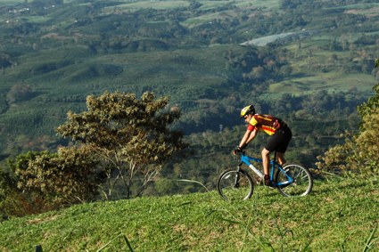 mountain bike descends slope of Turrialba Volcano into Turrialba Valley