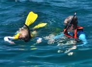 boy nd moter in deep water snorkel off Osa Peninsula
