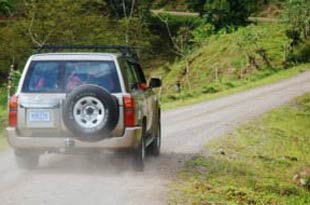 4 Wheel Drive vehicle on a dirt road in costa rica