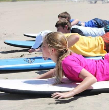 Children at a surf lesson in Costa Rica