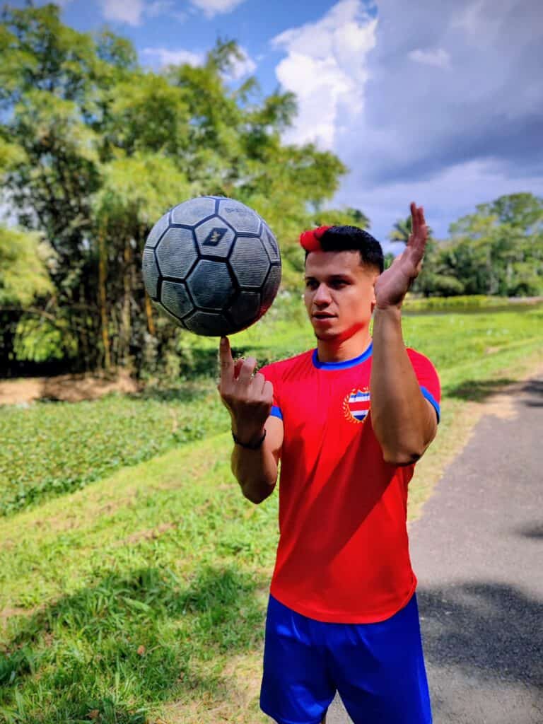 Dayron Mata spinning a football on his finger